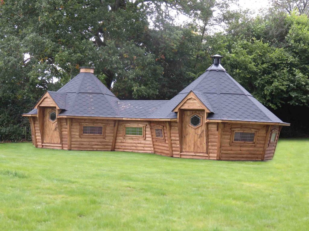 two barbecue cabins joined together