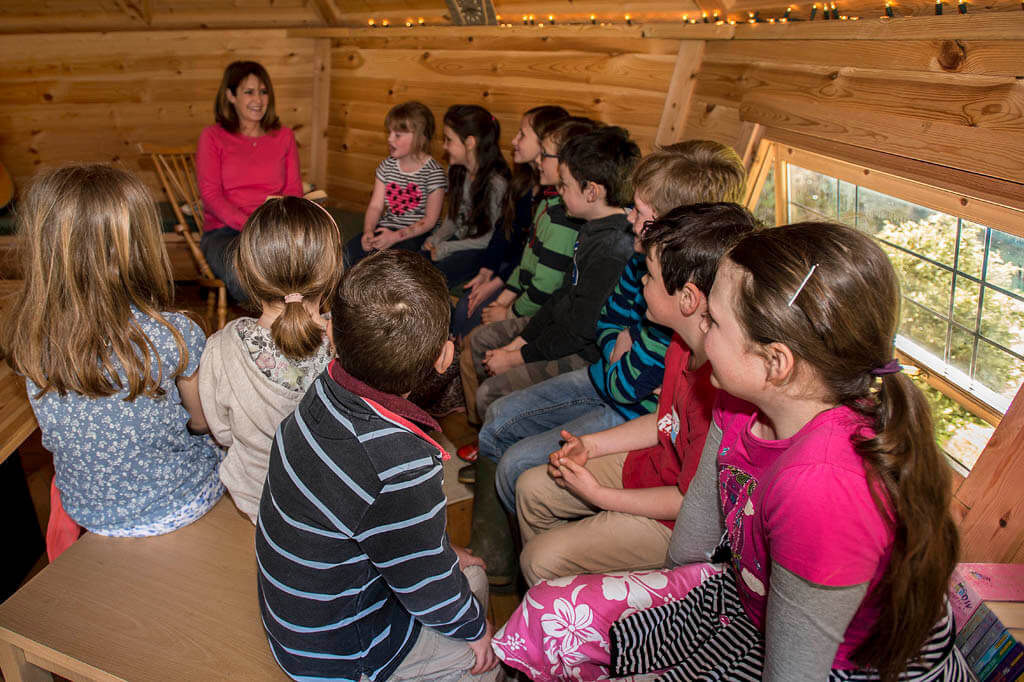class having lesson inside a bbq hut