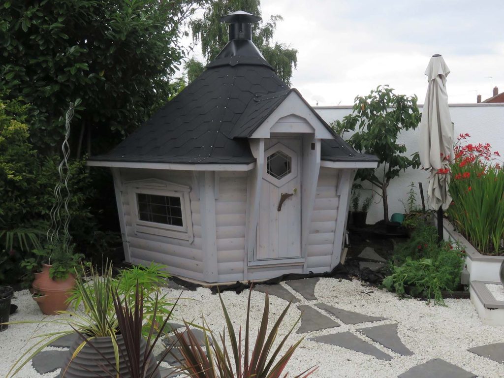 white coloured bbq hut